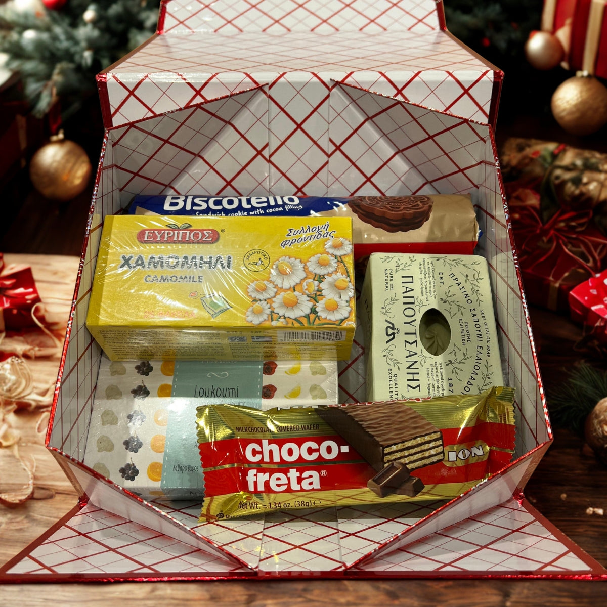 Greek holiday gift box with loukoumi, chamomile tea, chocolate wafers, cocoa biscuits and olive oil soap