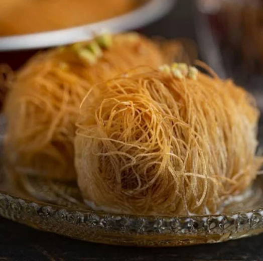 Greek kataifi dessert with shredded phyllo and syrup serving suggestion